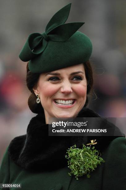 Britain's Catherine, Duchess of Cambridge, attends the St. Patrick's Day Parade with the 1st Battalion Irish Guards at Cavalry Barracks, Hounslow,...