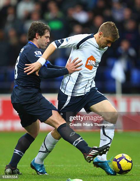 Ivan Klasnic of Bolton Wanderers tangles with David Dunn of Blackburn Rovers during the Barclays Premier League match between Bolton Wanderers and...