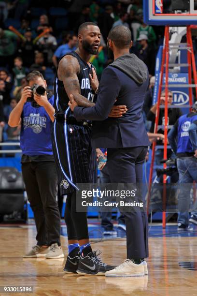 Jonathon Simmons of the Orlando Magic greets Kyrie Irving of the Boston Celtics after the game on March 16, 2018 at Amway Center in Orlando, Florida....