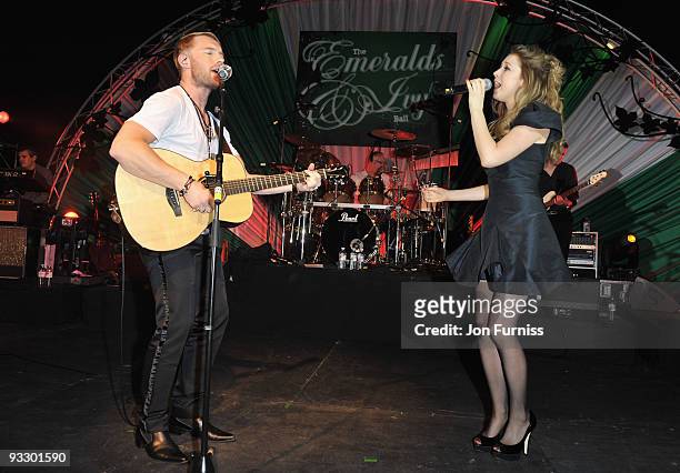 Ronan Keating and Hayley Westenra perform during Ronan Keating's fourth annual Emeralds and Ivy Ball in aid of Cancer Research UK at Battersea...