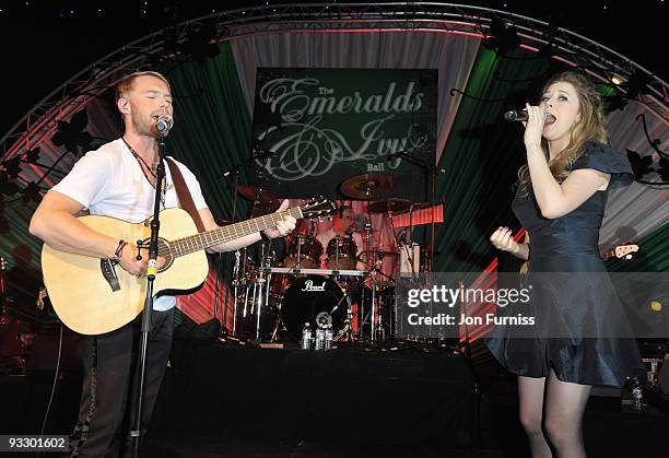 Ronan Keating and Hayley Westenra perform during Ronan Keating's fourth annual Emeralds and Ivy Ball in aid of Cancer Research UK at Battersea...