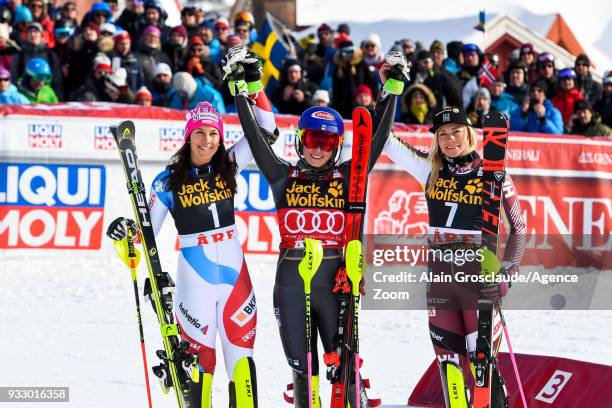 Wendy Holdener of Switzerland takes 2nd place, Mikaela Shiffrin of USA takes 1st place, Frida Hansdotter of Sweden takes 3rd place during the Audi...