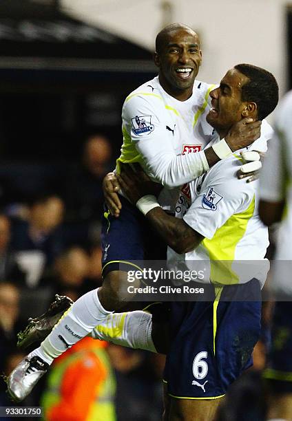 Jermain Defoe of Tottenham Hotspur celebrates his hatrick goal with Tom Huddlestone during the Barclays Premier League match between Tottenham...