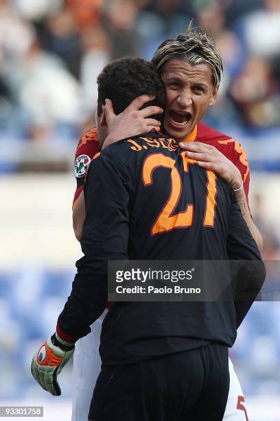 Philippe Mexes embraces Julio Sergio the goalkeeper of AS Roma during the Serie A match between Roma and Bari at Stadio Olimpico on November 22, 2009...