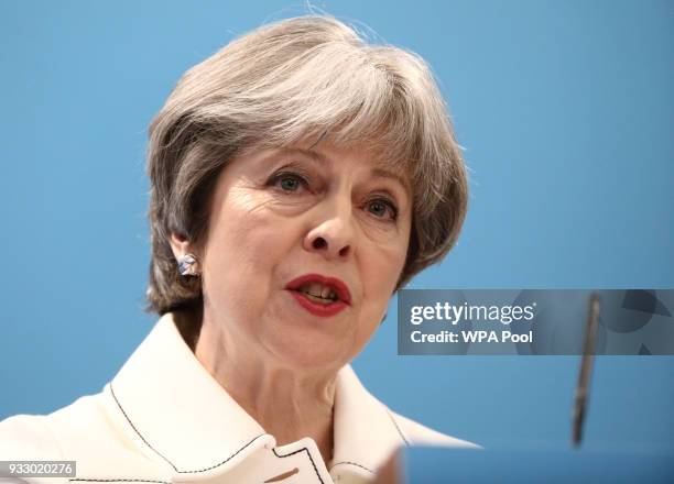 Britain's Prime Minister, Theresa May gives a speech at the Conservative Party's Spring Forum in central London on March 17, 2018 in London, England....