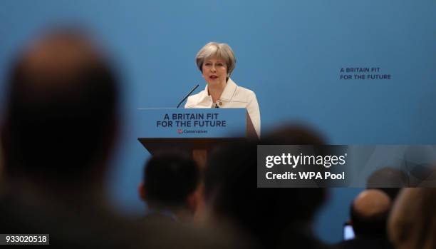 Britain's Prime Minister, Theresa May gives a speech at the Conservative Party's Spring Forum in central London on March 17, 2018 in London, England....