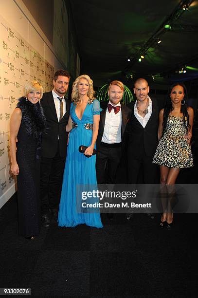 Keith Duffy, Ronan Keating and Shane Lynch from Boyzone arrive at the fourth annual Emeralds And Ivy Ball in aid of Cancer Research UK at Battersea...