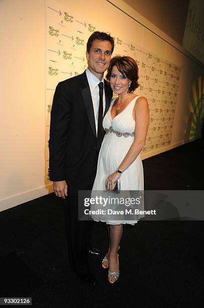 Presenter Natasha Kaplinsky and her husband Justin Bower arrive at the fourth annual Emeralds And Ivy Ball in aid of Cancer Research UK at Battersea...