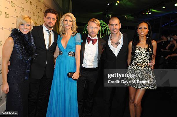 Keith Duffy, Ronan Keating and Shane Lynch from Boyzone arrive at the fourth annual Emeralds And Ivy Ball in aid of Cancer Research UK at Battersea...