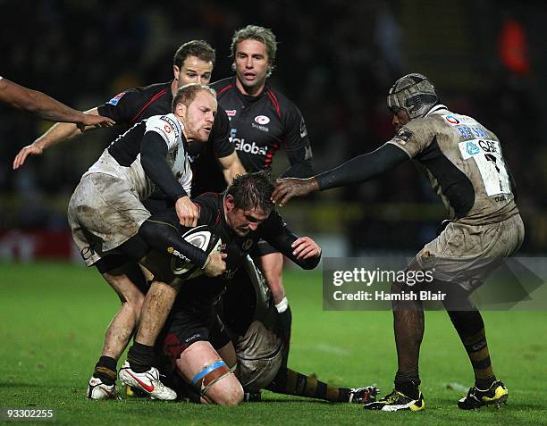 Ernst Joubert of Saracens in tackled by Joe Simpson of Wasps during the Guinness Premiership match between Saracens and London Wasps at Vicarage Road...