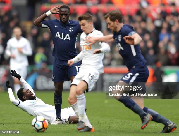 Nathan Dyer of Swansea City is fouled by Moussa Sissoko of Tottenham Hotspur during The Emirates FA Cup Quarter Final match between Swansea City and...