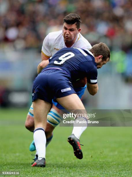 Jake Polledri of Italy is tackled by Greig Laidlaw of Scotland during the NatWest Six Nations match between Italy and Scotland at Stadio Olimpico on...