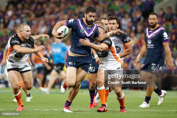 Jesse Bromwich of the Melbourne Storm runs with the ball during the round two NRL match between the Melbourne Storm and the Wests Tigers at AAMI Park...