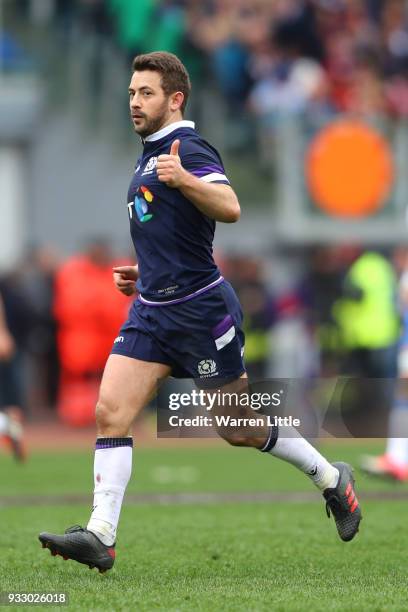 Greig Laidlaw of Scotland celebrates after his side scored during the NatWest Six Nations match between Italy and Scotland at Stadio Olimpico on...