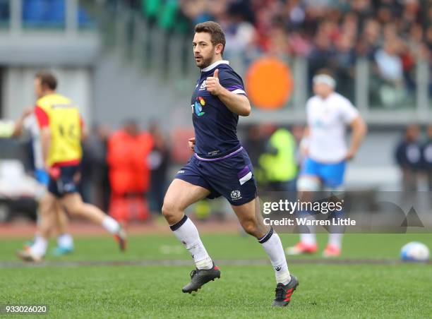 Greig Laidlaw of Scotland celebrates after his side scored during the NatWest Six Nations match between Italy and Scotland at Stadio Olimpico on...