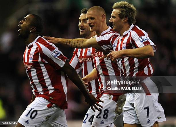 Stoke City's Jamaican forward Ricardo Fuller celebrates after scoring against Portsmouth during their English Premier League football match at The...