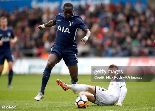 Tottenham Hotspur's Moussa Sissoko and Swansea City's Tom Carroll battle for the ball during the Emirates FA Cup, quarter final match at the Liberty...