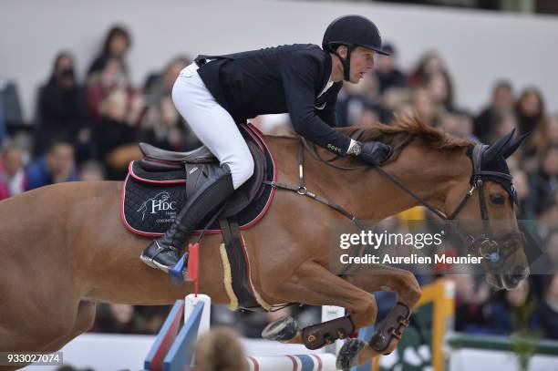 Kevin Staut of France on Ayade de Septon et HDC competes during the Saut Hermes at Le Grand Palais on March 17, 2018 in Paris, France.