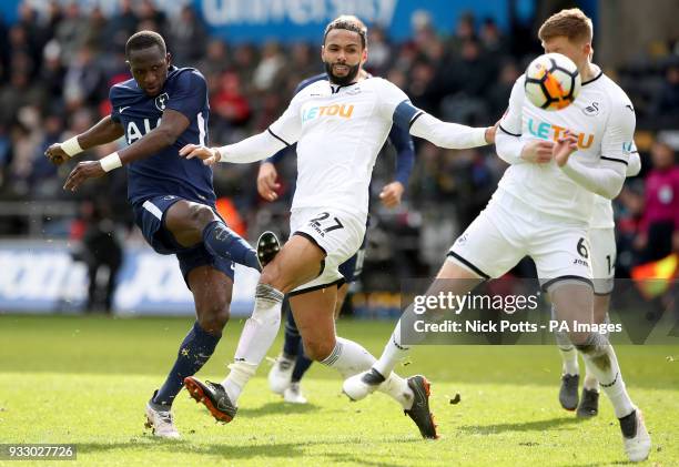 Swansea City's Kyle Bartley and Tottenham Hotspur's Moussa Sissoko battle for the ball during the Emirates FA Cup, quarter final match at the Liberty...