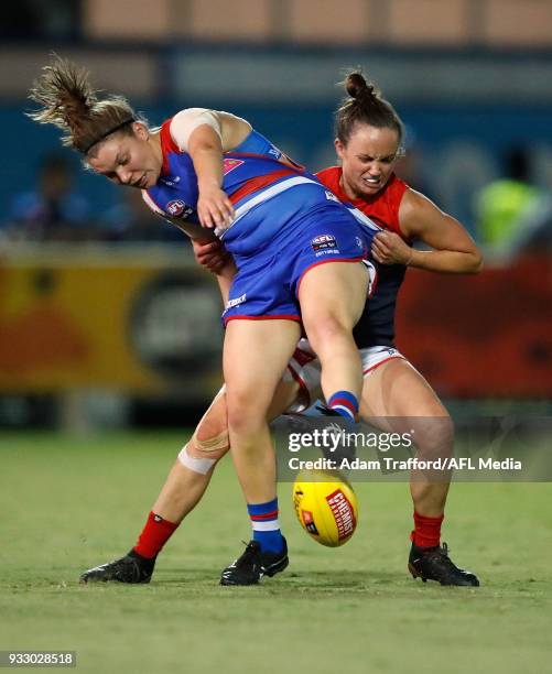 Kirsty Lamb of the Bulldogs is tackled by Daisy Pearce of the Demons during the 2018 AFLW Round 07 match between the Western Bulldogs and the...