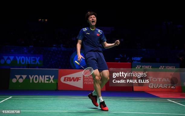 China's Shi Yuqi celebrates beating South Korea's Son Wan Ho during their men's singles semi-final match All England Open Badminton Championships in...
