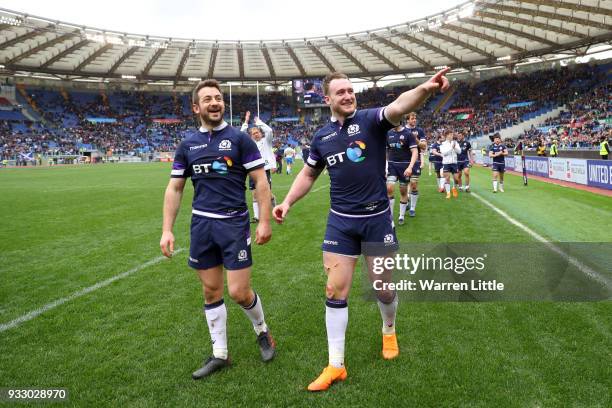 Stuart Hogg of Scotland and Greig Laidlaw of Scotland celebrate victory after the NatWest Six Nations match between Italy and Scotland at Stadio...