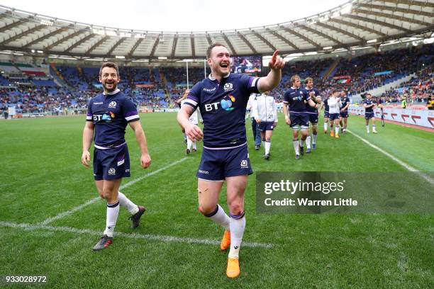 Stuart Hogg of Scotland and Greig Laidlaw of Scotland celebrate victory after the NatWest Six Nations match between Italy and Scotland at Stadio...