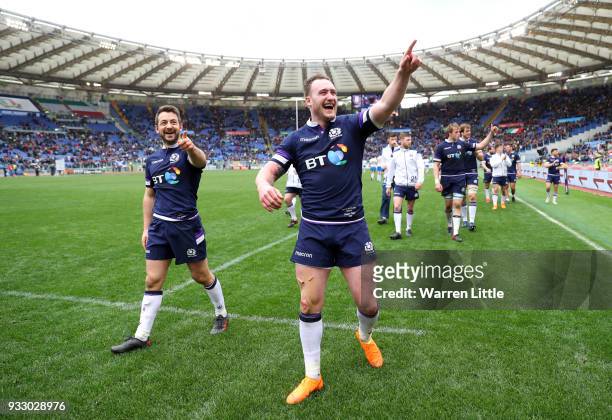 Stuart Hogg of Scotland and Greig Laidlaw of Scotland celebrate victory after the NatWest Six Nations match between Italy and Scotland at Stadio...