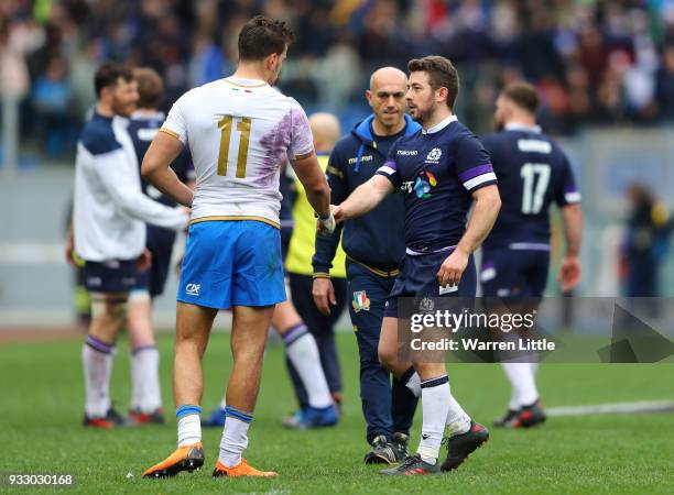 Greig Laidlaw of Scotland and Mattia Bellini of Italy shake hands after the NatWest Six Nations match between Italy and Scotland at Stadio Olimpico...