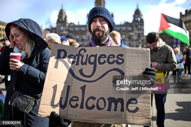 Anti-racism demonstrators take part in a rally through the city centre on March 17, 2018 in Glasgow, Scotland. The event, organised by Stand up to...