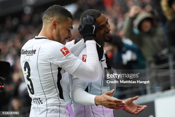 Kevin Prince-Boateng of Frankfurt celebrates with Simon Falette of Frankfurt after he scored a goal to make it 1:0 during the Bundesliga match...