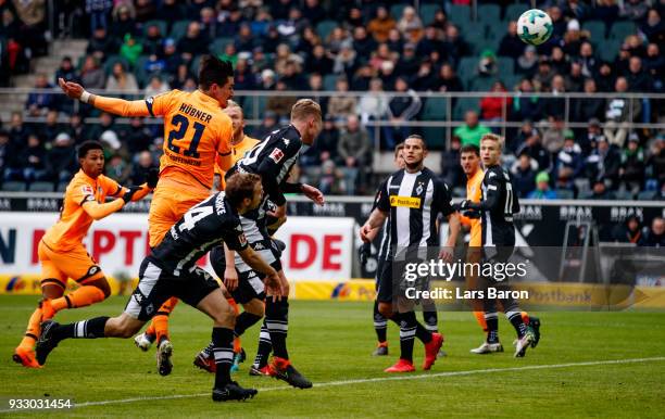 Benjamin Huebner of Hoffenheim scores his teams first goal during the Bundesliga match between Borussia Moenchengladbach and TSG 1899 Hoffenheim at...