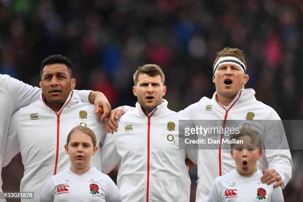 Mako Vunipola of England, Richard Wigglesworth of England, and Dylan Hartley of England sing the national anthem prior to the NatWest Six Nations...