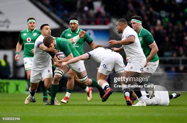 London , United Kingdom - 17 March 2018; Iain Henderson of Ireland is tackled by Ben Te'o of England during the NatWest Six Nations Rugby...