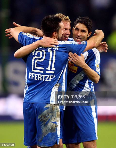 Dennis Grote of Bochum celebrate with his team mates after the Bundesliga match between Hamburger SV and VfL Bochum at the HSH Nordbank Arena on...