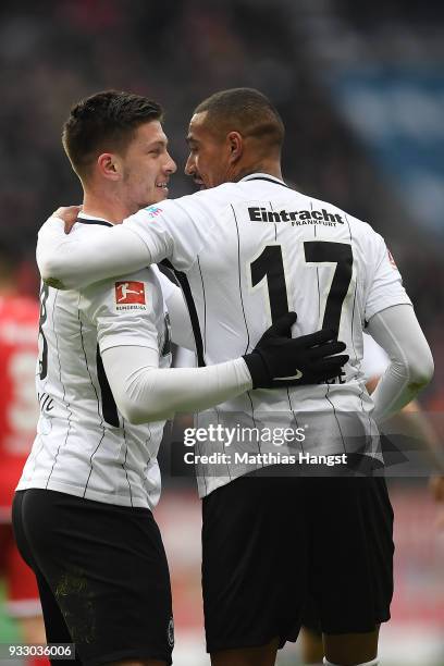 Luka Jovic of Frankfurt celebrates with Kevin Prince-Boateng of Frankfurt after he scored a goal to make it 2:0 during the Bundesliga match between...