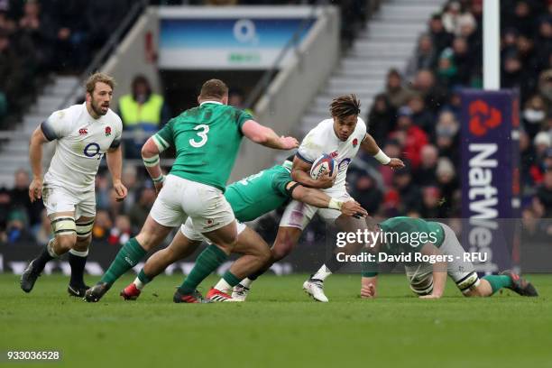 Anthony Watson of England is tacked during the NatWest Six Nations match between England and Ireland at Twickenham Stadium on March 17, 2018 in...