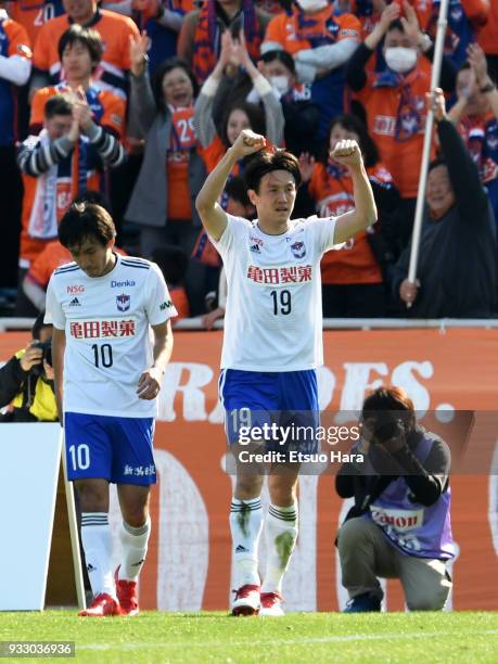 Kisho Yano of Albirex Niigata celebrates scoring his side's second goal during the J.League J2 match between Yokohama FC and Albirex Niigata at...