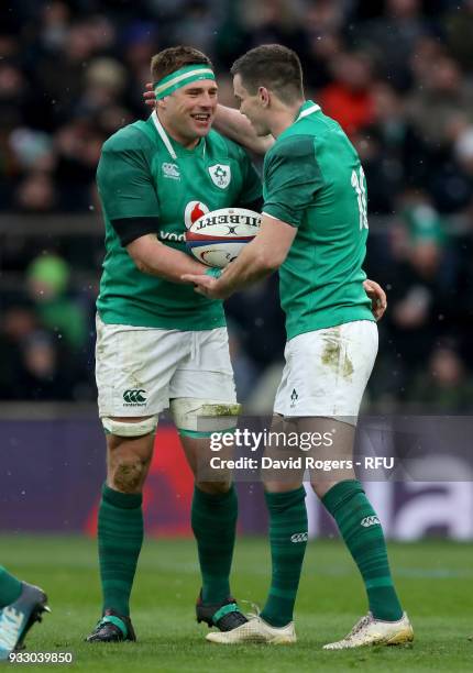 Stander of Ireland celebrates with Jonathan Sexton of Ireland after scoring his sides second try during the NatWest Six Nations match between England...