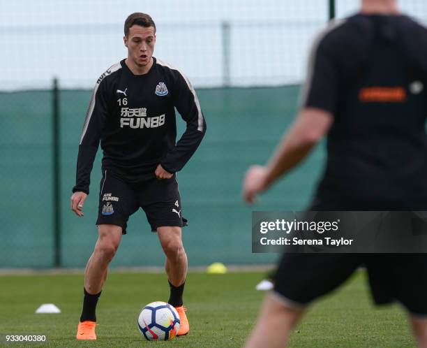 Javier Manquillo passes the ball during the Newcastle United Training Session at Hotel La Finca on March 17 in Alicante, Spain.