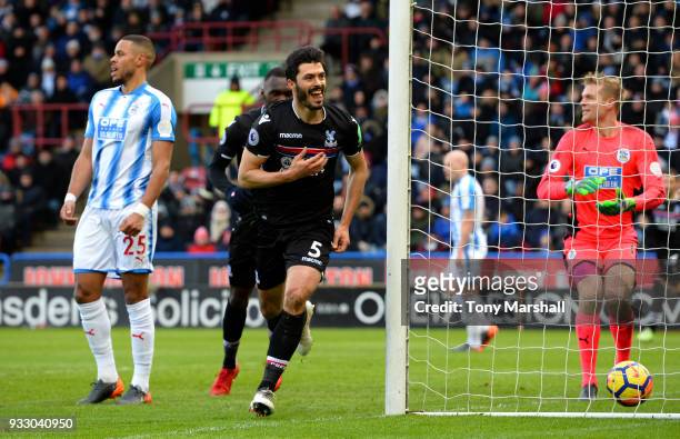 James Tomkins of Crystal Palace celebrates scoring his side's first goal during the Premier League match between Huddersfield Town and Crystal Palace...