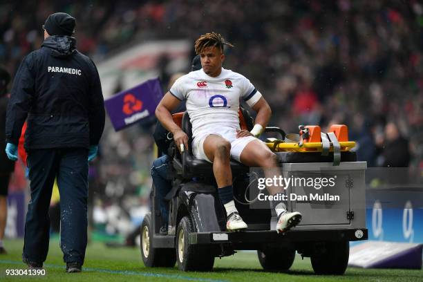 Anthony Watson of England leaves the pitch due to injury during the NatWest Six Nations match between England and Ireland at Twickenham Stadium on...