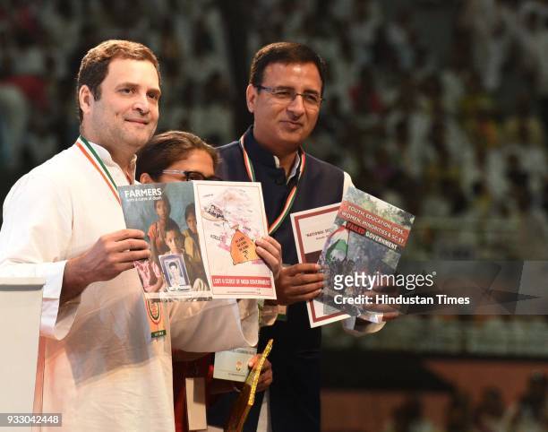 Congress president Rahul Gandhi released a set of books against Modi Govt during the 84th Plenary Session of Indian National Congress at the Indira...