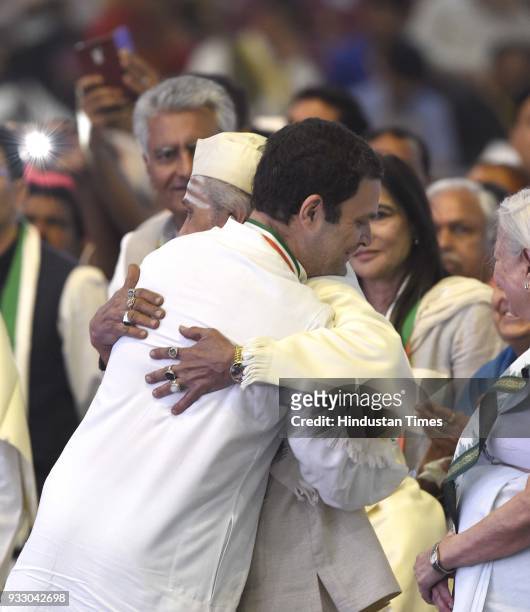 Congress President Rahul Gandhi felicitates senior citizens and congress party workers during the 84th Plenary Session of Indian National Congress at...