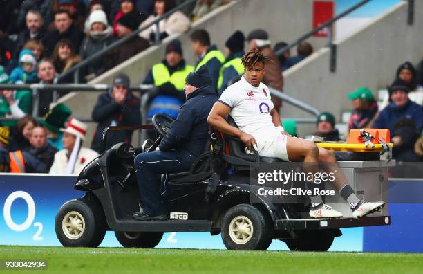 Anthony Watson of England leaves the pitch due to injury during the NatWest Six Nations match between England and Ireland at Twickenham Stadium on...