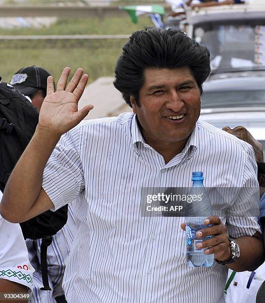 Bolivian President Evo Morales Ayma waves during a rally on November 22, 2009 in Santa Cruz, Bolivia. Morales searches re-election in next December 6...