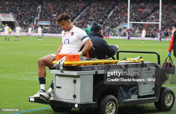 Anthony Watson of England leaves the pitch due to injury during the NatWest Six Nations match between England and Ireland at Twickenham Stadium on...