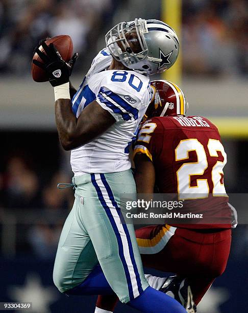 Wide receiver Martellus Bennett of the Dallas Cowboys makes a pass reception against Carlos Rogers of the Washington Redskins at Dallas Cowboys...