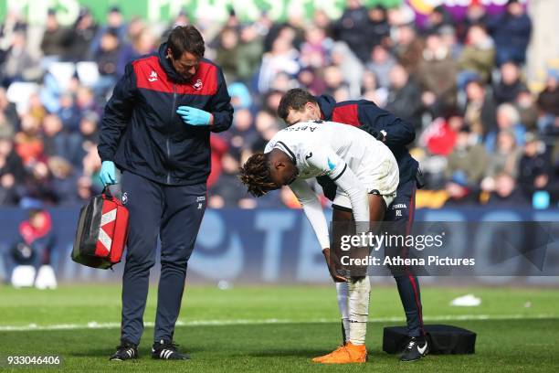 Tammy Abraham of Swansea receives treatment for an injury during the Fly Emirates FA Cup Quarter Final match between Swansea City and Tottenham...