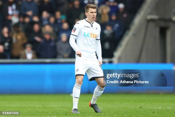 Tom Carroll of Swansea during the Fly Emirates FA Cup Quarter Final match between Swansea City and Tottenham Hotspur at the Liberty Stadium on March...